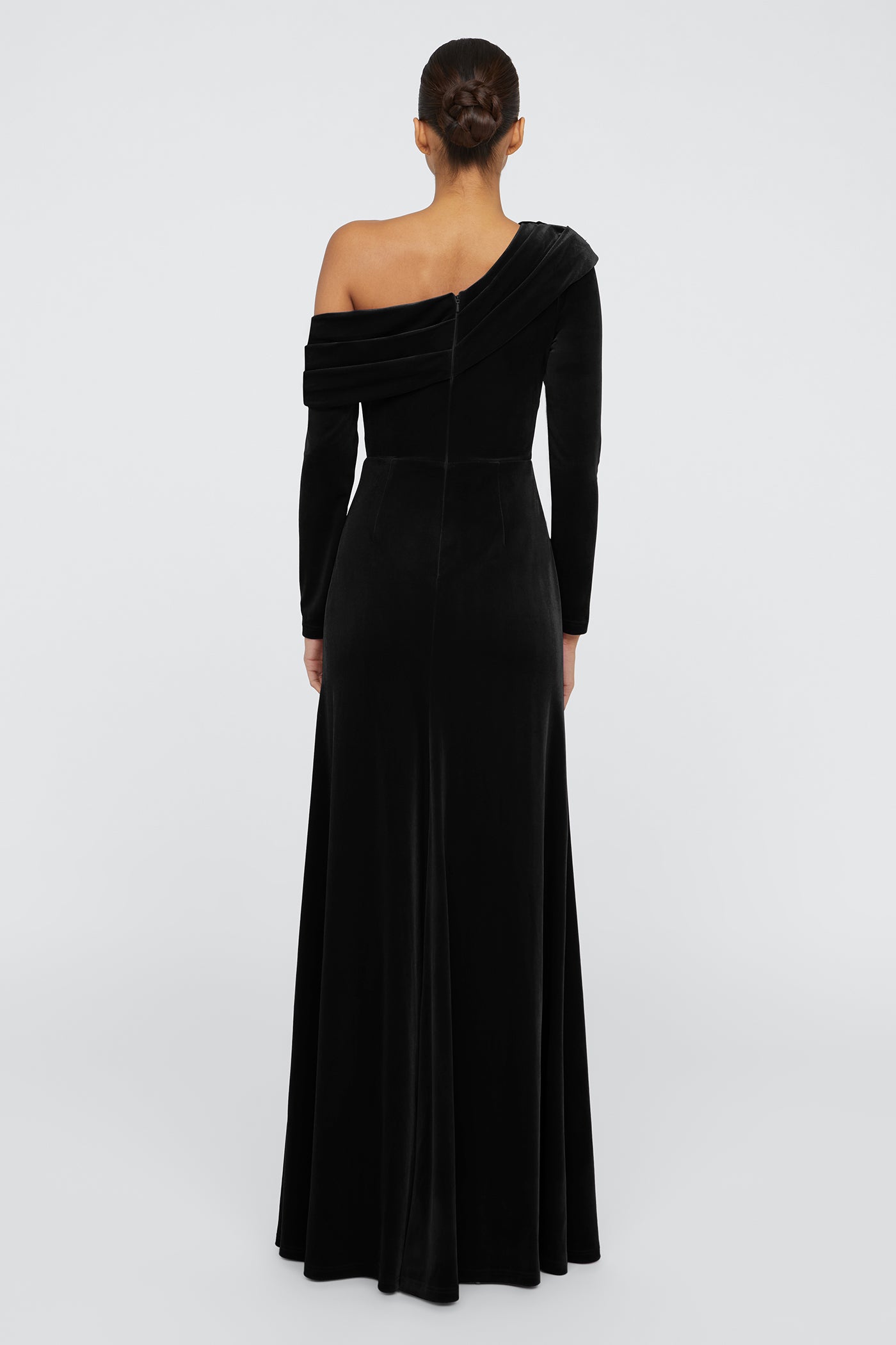 Black one-shoulder evening gown on a white background