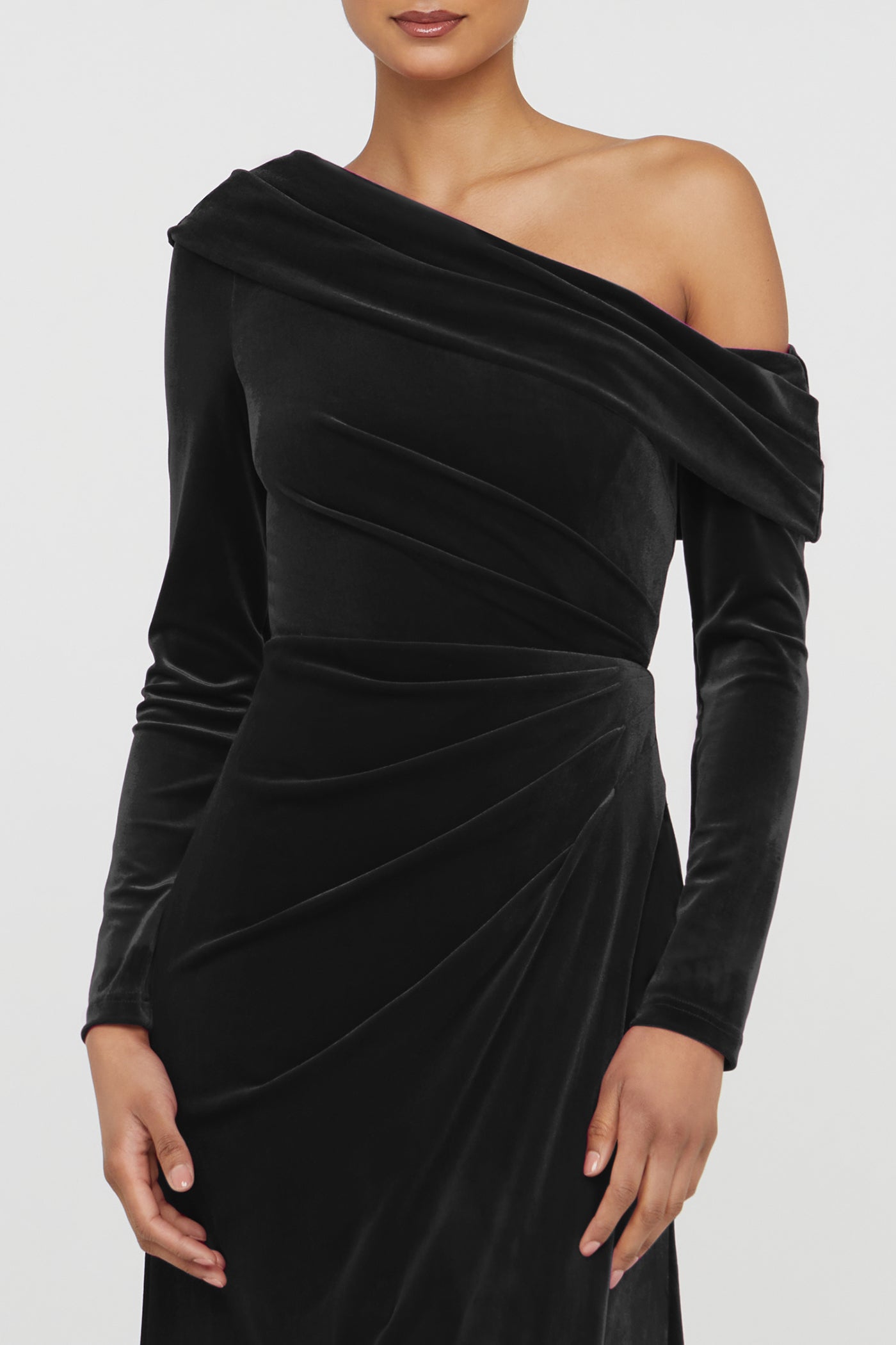 Black one-shoulder dress on a white background