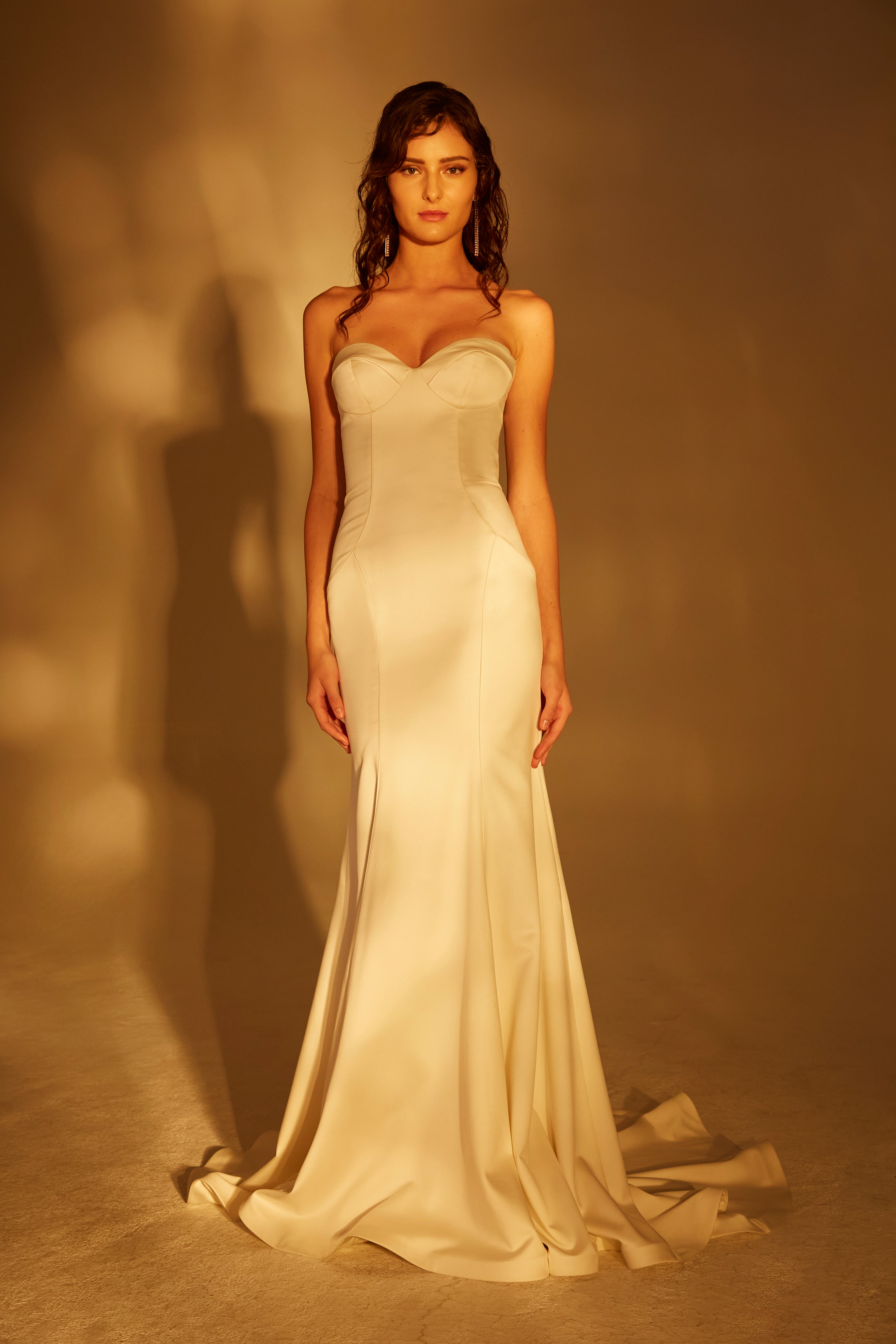 Stretch satin strapless sweetheart gown with contoured piping detail