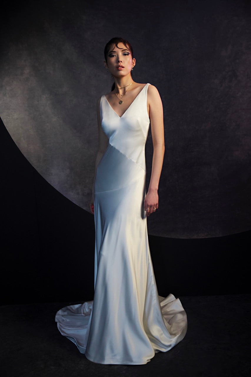 V-neck bias satin gown with detachable back drape