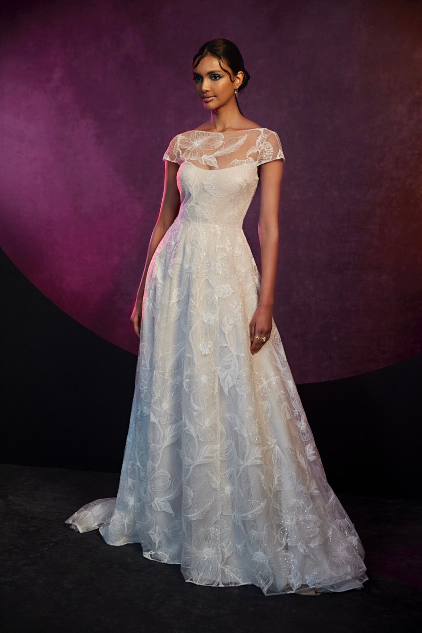 Dogwood embroidered a-line gown with cap sleeves and open back